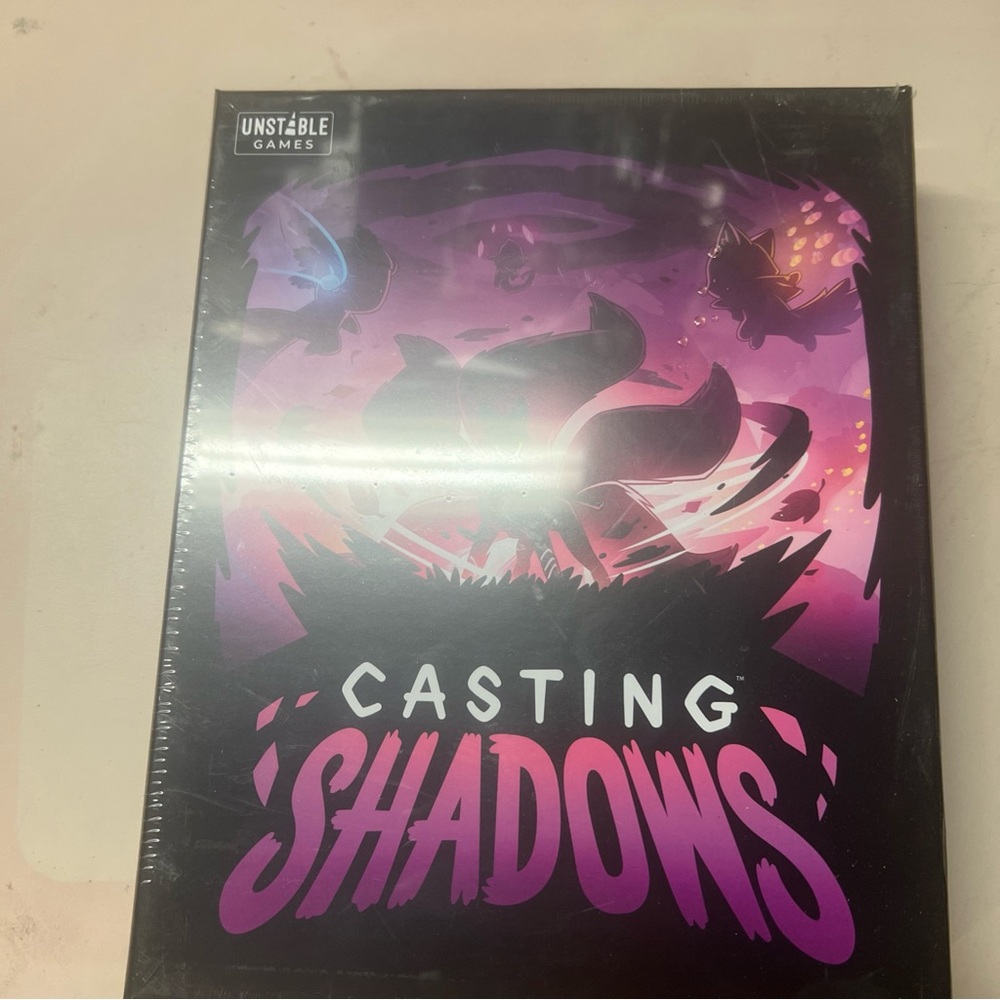 Casting Shadows Board Game - Black and Purple